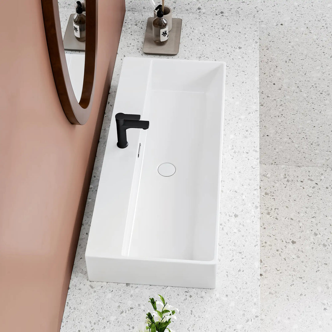 White rectangular ceramic vanity top with single faucet hole