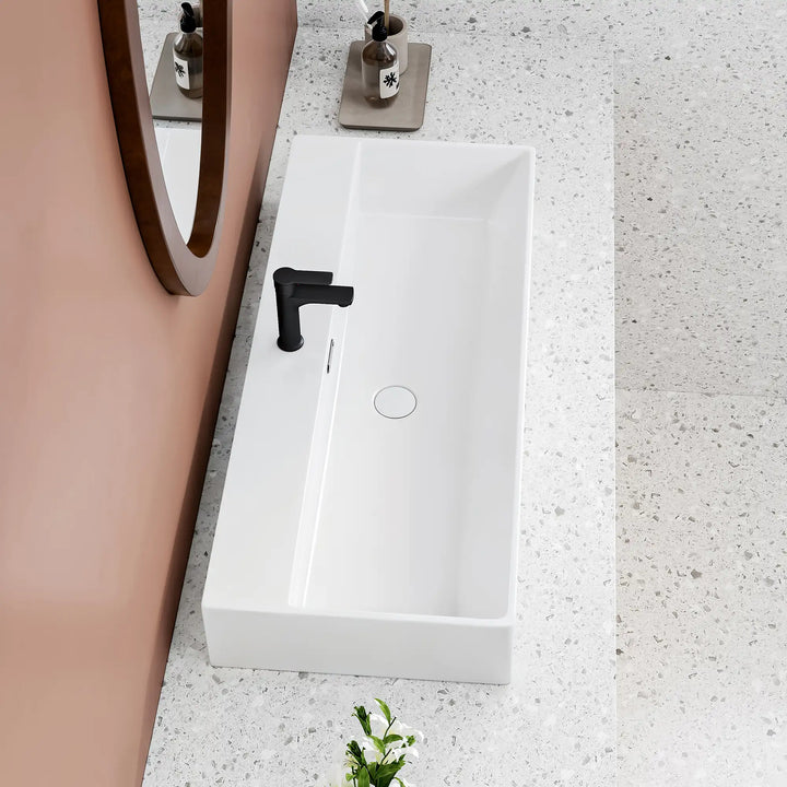White rectangular ceramic vanity top with single faucet hole