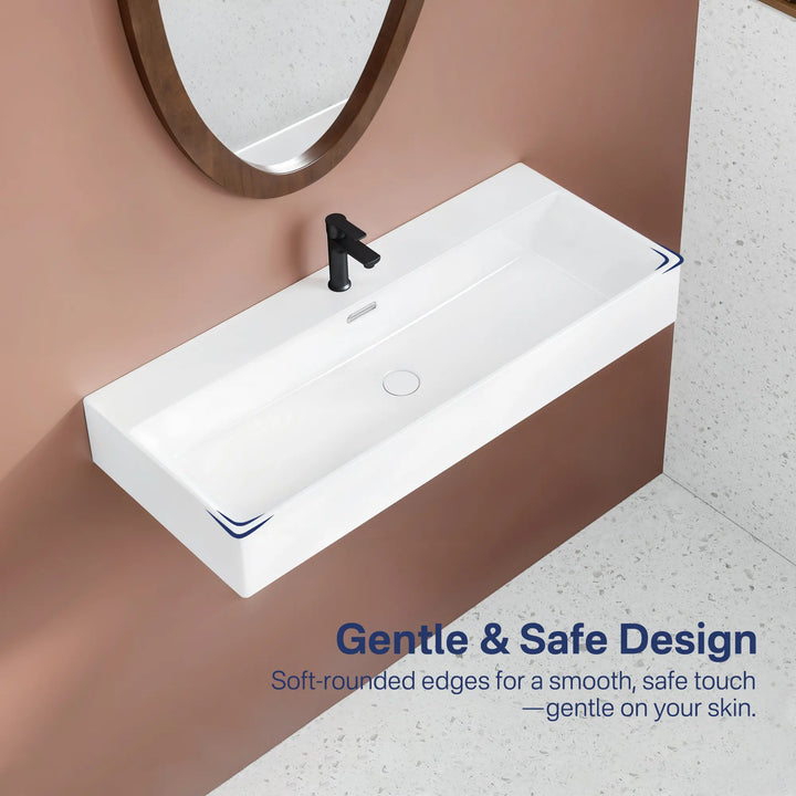 White rectangular ceramic sink with soft rounded edges