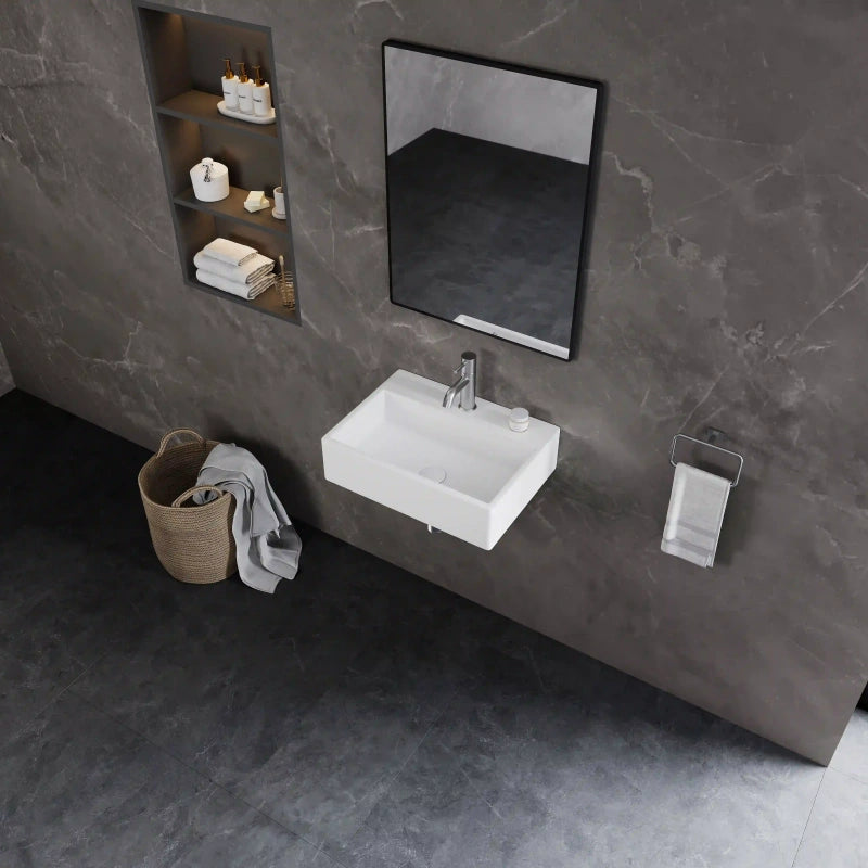 White rectangular wall-mounted ceramic sink with silver bathroom faucet