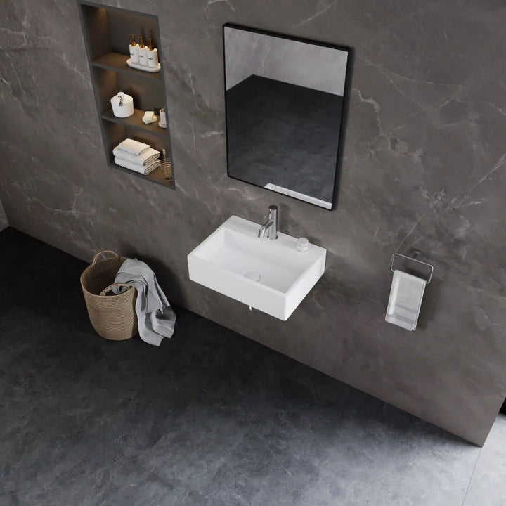 White rectangular wall-mounted ceramic sink with silver bathroom faucet