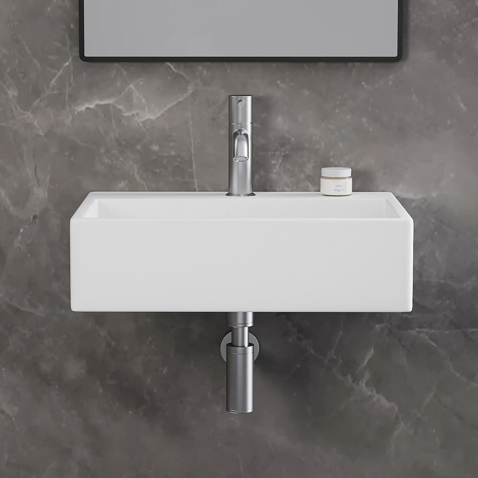 White rectangular wall-mounted solid surface bathroom sink with brushed nickel faucet