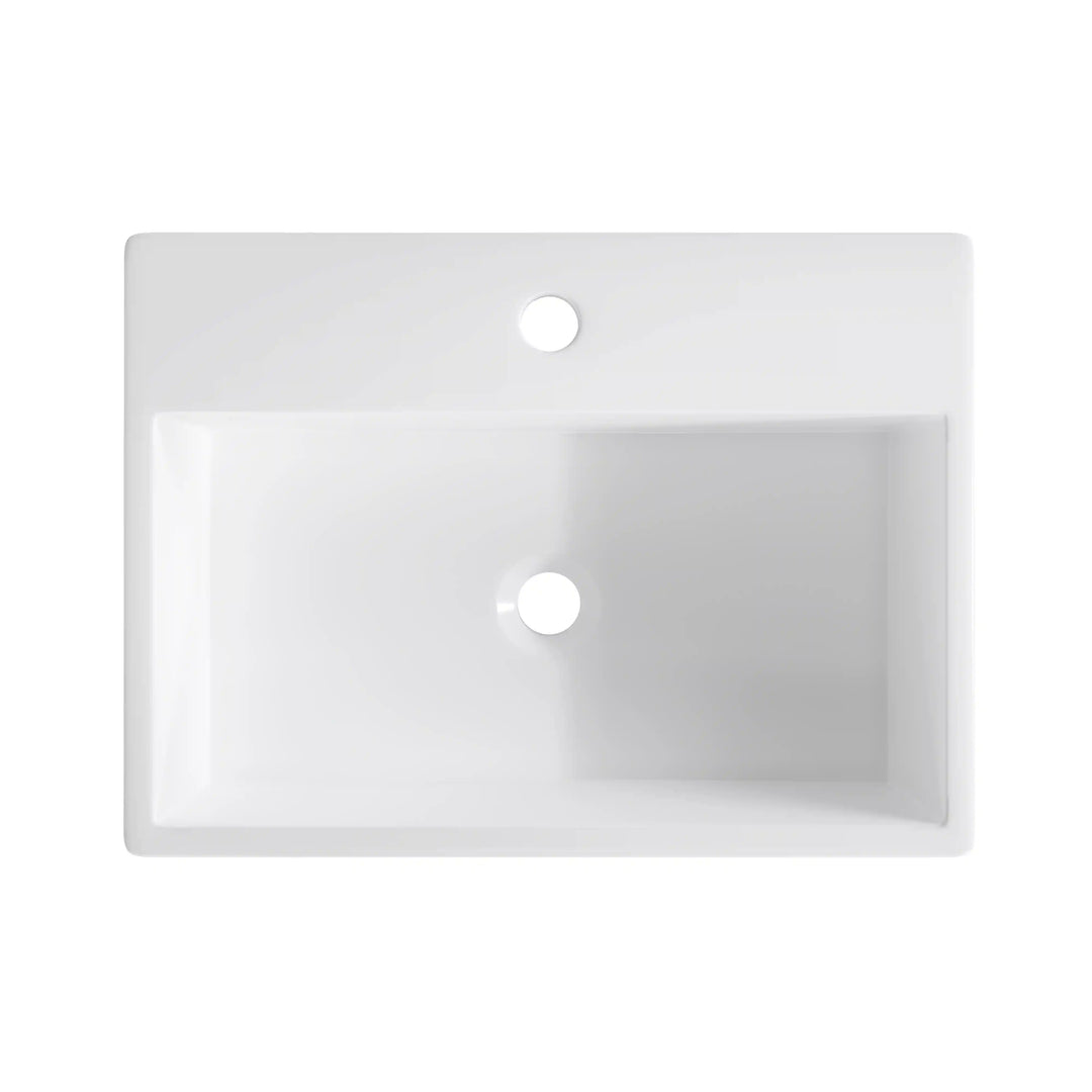White rectangular ceramic vanity sink with single faucet hole and central drain
