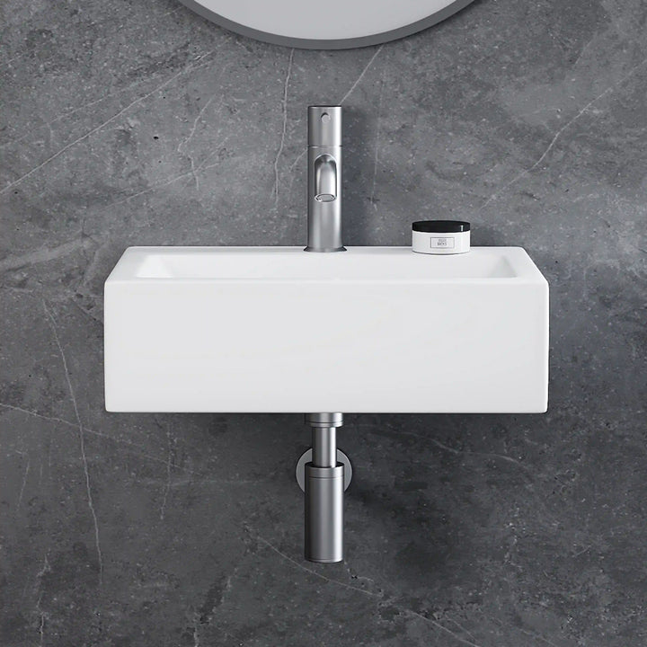 White rectangular wall-mounted ceramic vessel sink with brushed nickel pull-out faucet