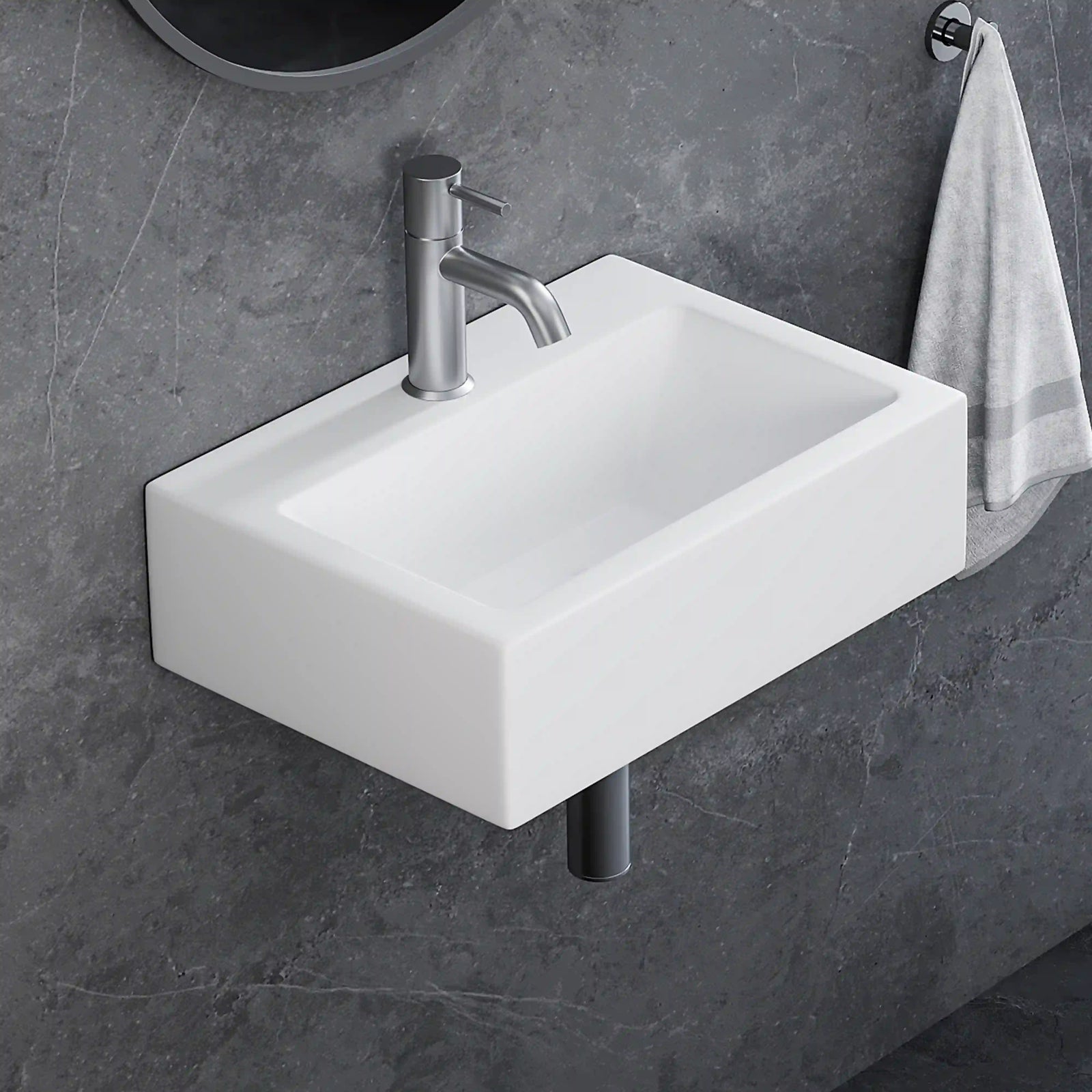 White rectangular wall-mounted ceramic sink with brushed nickel faucet