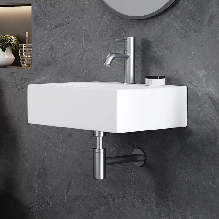 White rectangular ceramic wall mount sink with single lever stainless steel faucet
