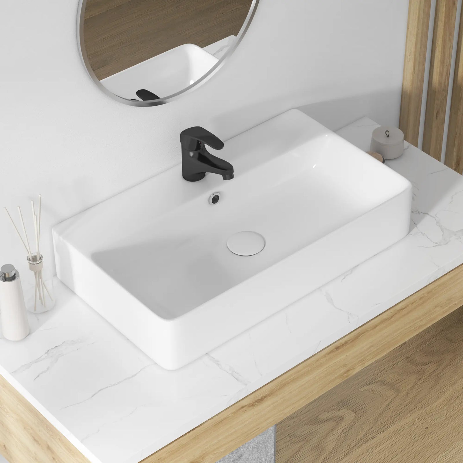 White rectangular ceramic vessel sink with black faucet.