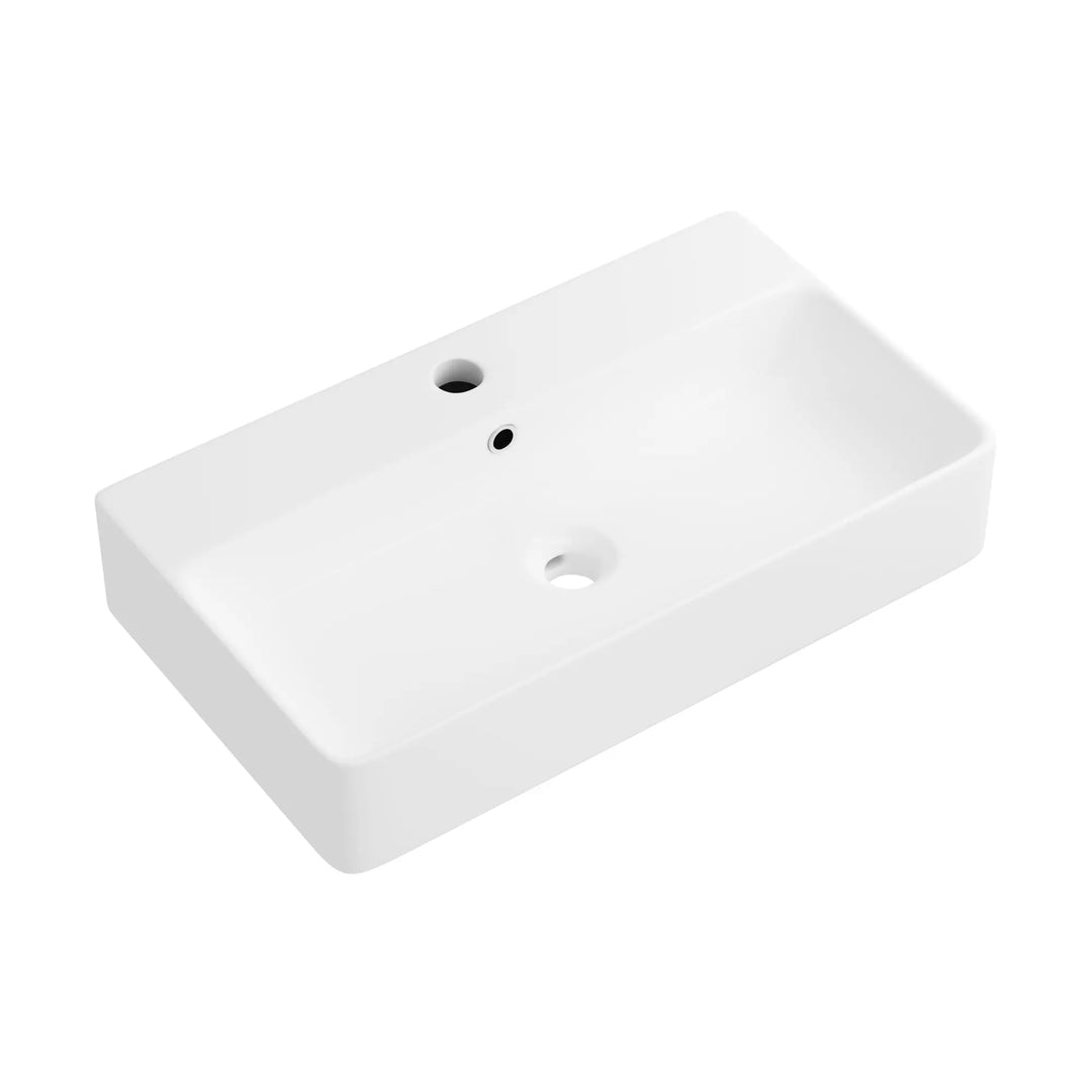 White rectangular ceramic sink with faucet and overflow holes.