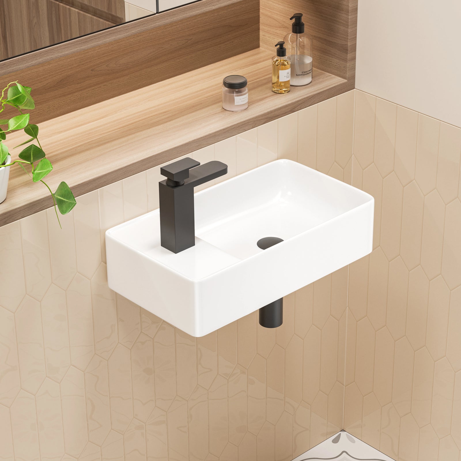 White wall-mounted rectangular ceramic sink with matte black faucet.